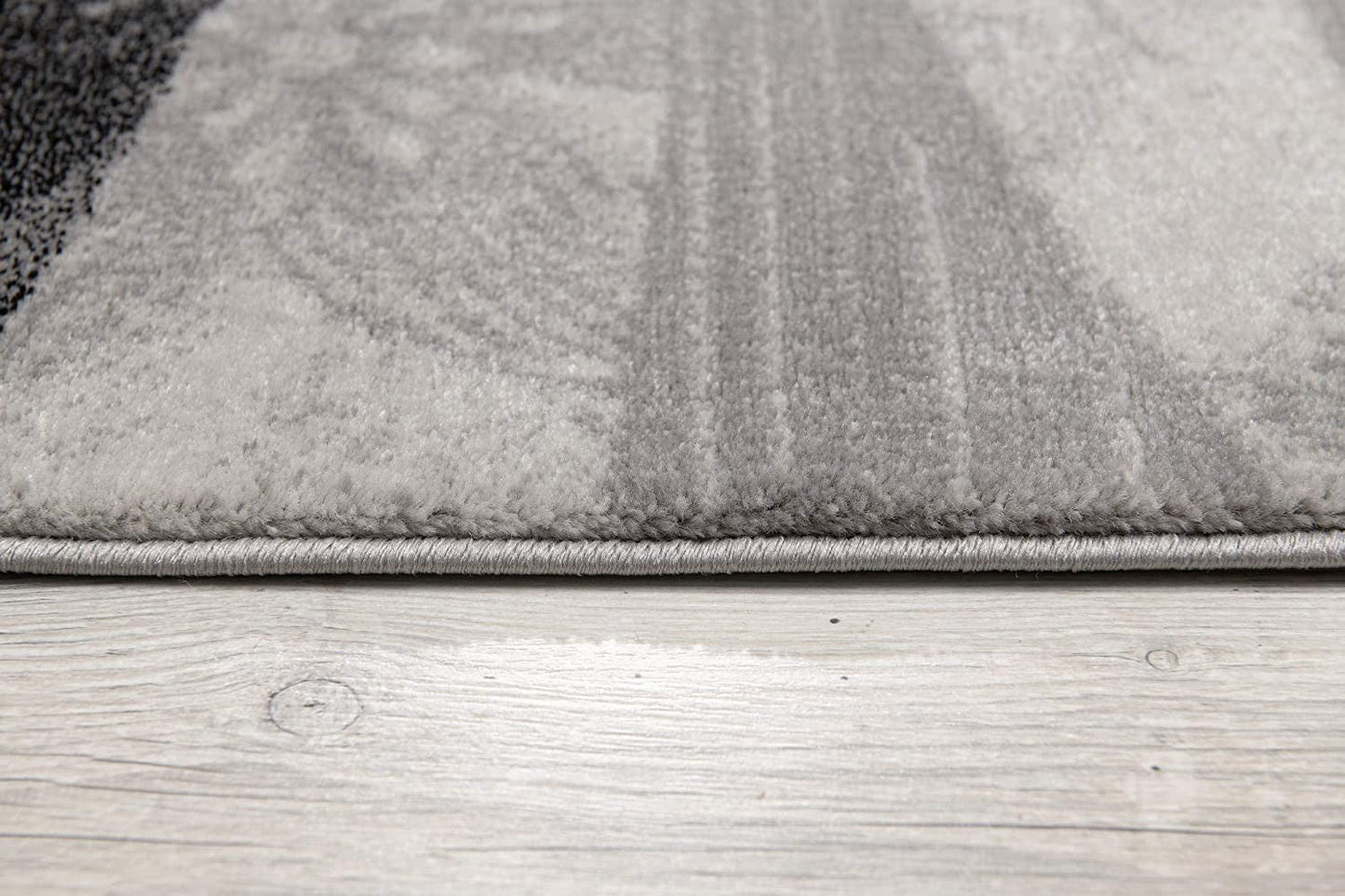 HomeRoots 2' x 8' Gray and Black Abstract Waves Runner Rug