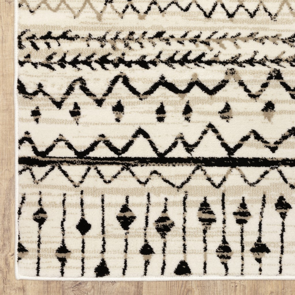HomeRoots 2' x 8' Ivory and Black Eclectic Patterns Indoor Runner Rug
