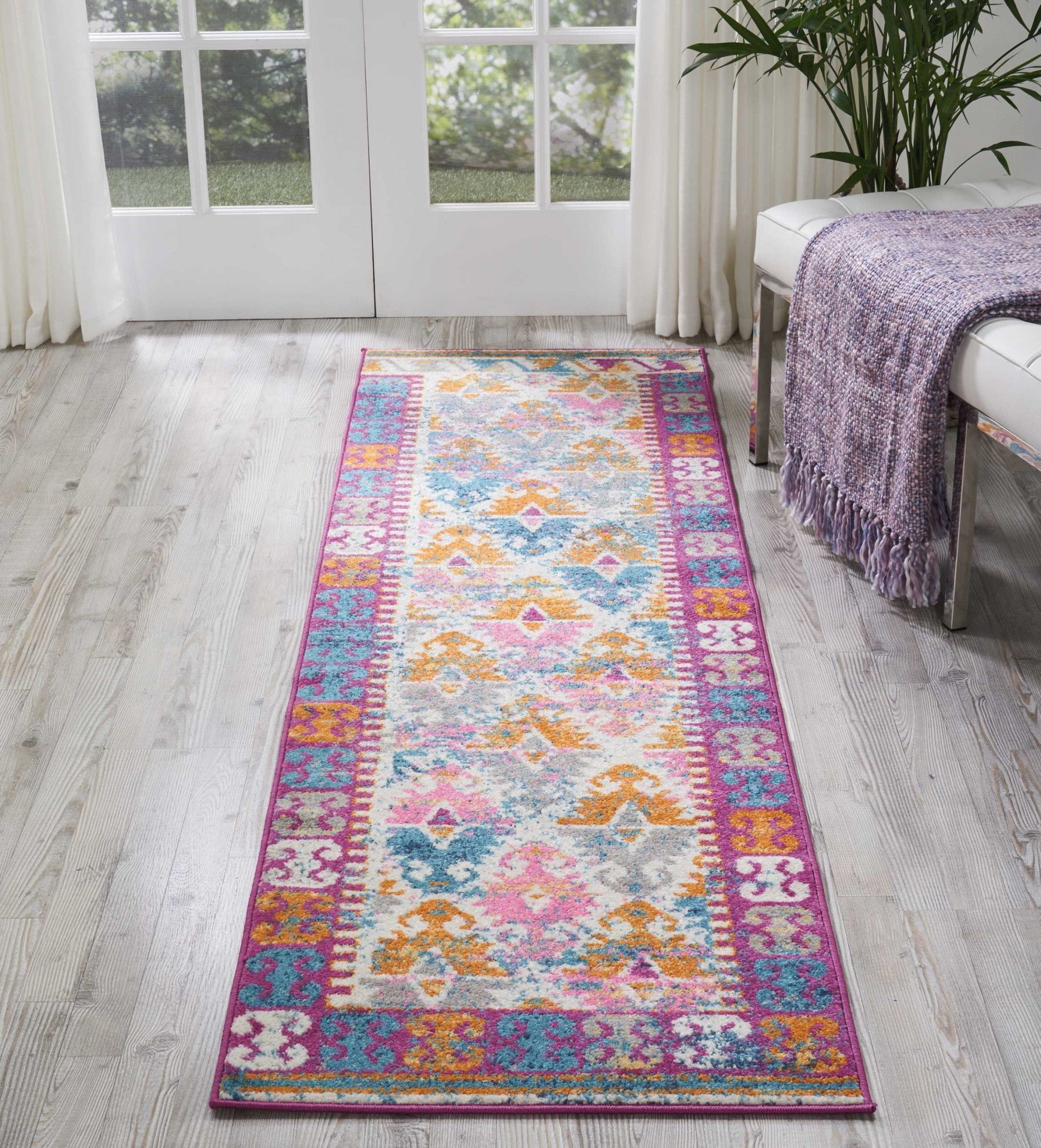 HomeRoots 2' x 8' Ivory and Magenta Tribal Pattern Runner Rug