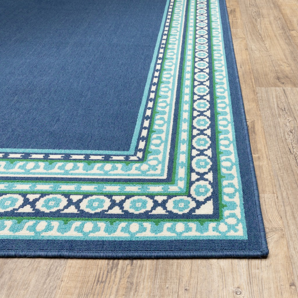 HomeRoots 2’ x 8’ Navy and Green Geometric Indoor Outdoor Runner Rug