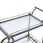 HomeRoots 20" x 31" x 31" Metal Casters Serving Cart in Black Gold and Clear Glass Finish