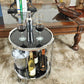 HomeRoots 22" Glass Round Mirrored End Table With Shelf in Silver Finish