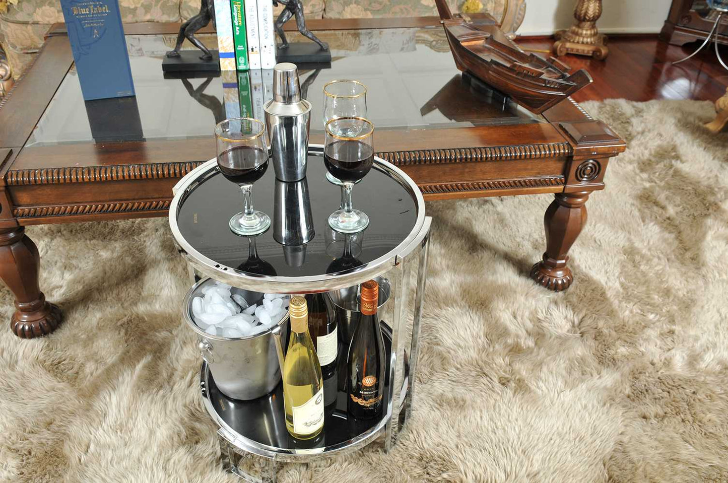HomeRoots 22" Glass Round Mirrored End Table With Shelf in Silver Finish