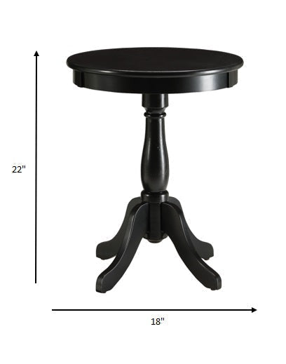 HomeRoots 22" Round Pedestal Wooden Side Table in Matte Black Finish