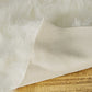HomeRoots 24" x 36" x 1.5" Faux Rectangular Area Rug in Off White Finish
