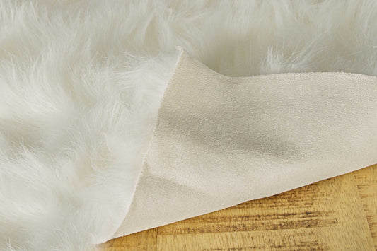 HomeRoots 24" x 36" x 1.5" Faux Rectangular Area Rug in Off White Finish