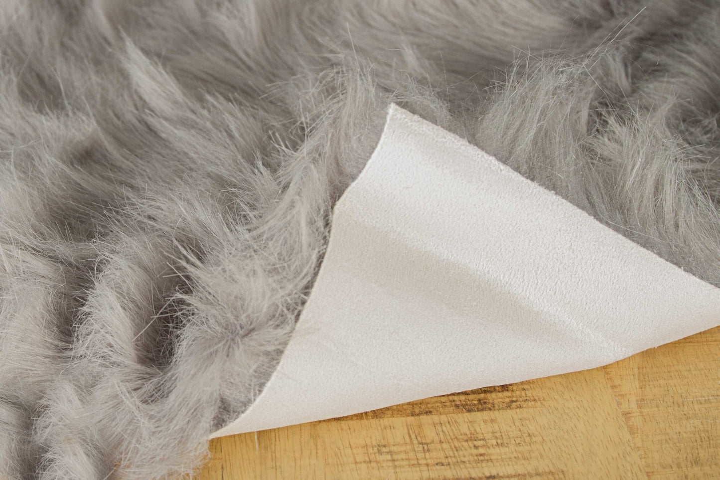 HomeRoots 24" x 36" x 1.5" Sheepskin Faux Fur Single Area Rug in Gray Finish
