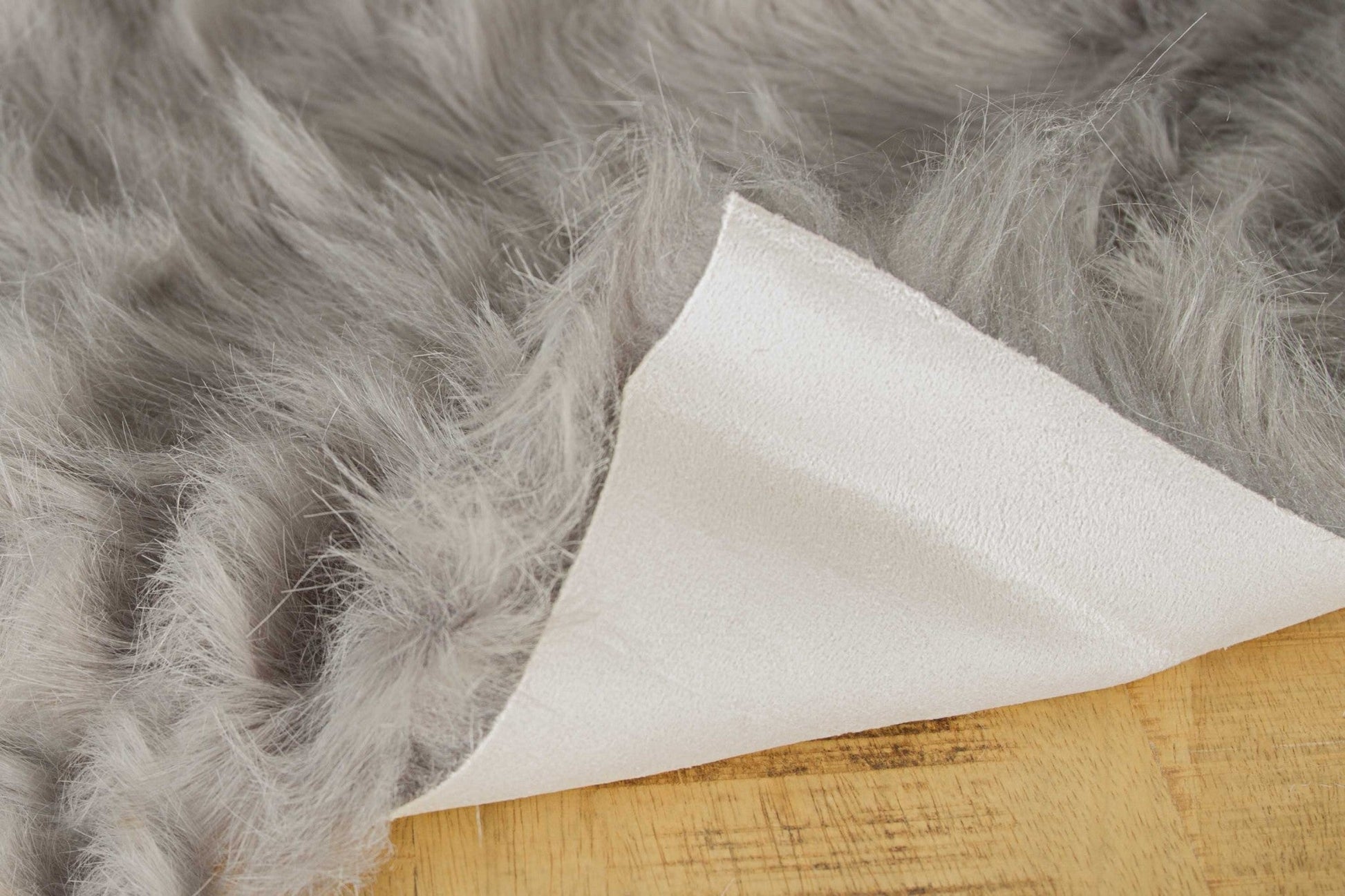 HomeRoots 24" x 36" x 1.5" Sheepskin Faux Fur Single Area Rug in Gray Finish