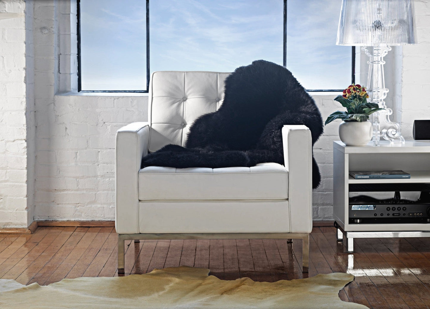 HomeRoots 24" x 36" x 1.5" Single Sheepskin Area Rug in Black Finish