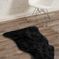 HomeRoots 24" x 36" x 1.5" Single Sheepskin Area Rug in Black Finish
