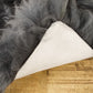 HomeRoots 24" x 36" x 1.5" Single Sheepskin Area Rug in Gray Finish