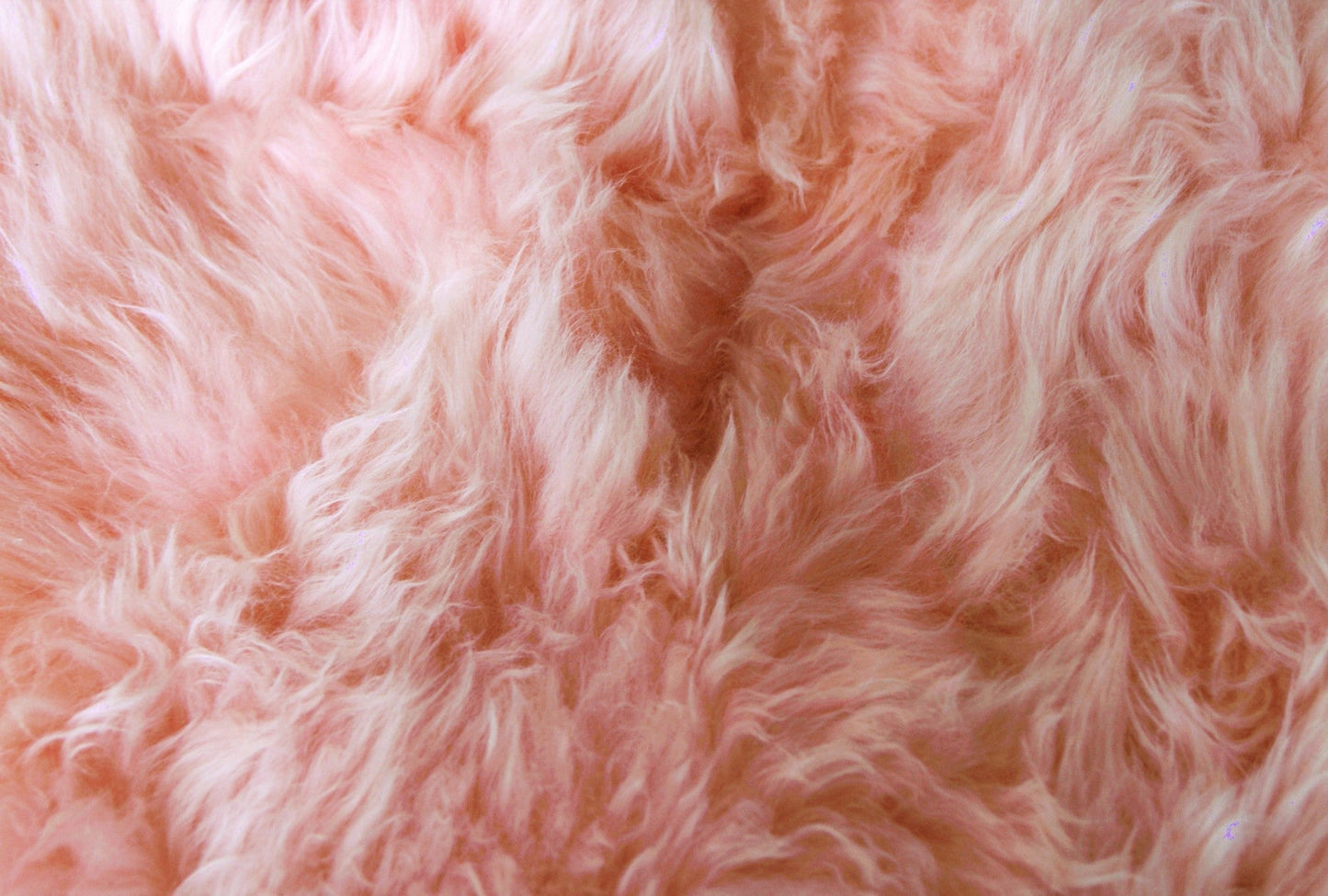 HomeRoots 24" x 36" x 1.5" Single Sheepskin Area Rug in Pink Finish