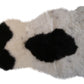 HomeRoots 24" x 36" x 1.5" x 2" Spotted Sheepskin Single Short Haired Area Rug