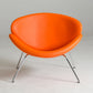 HomeRoots 28" Leatherette and Metal Accent Chair in Orange Finish