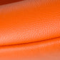HomeRoots 28" Leatherette and Metal Accent Chair in Orange Finish