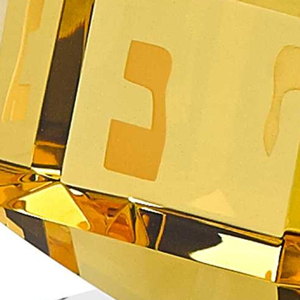 HomeRoots 3 Mouth Blown Amber Dreidel On Crystal Stand