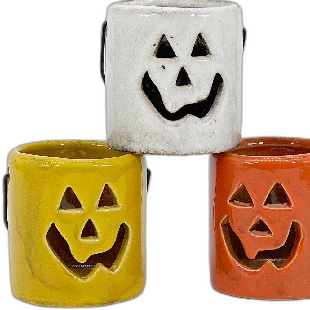 HomeRoots 3" Set of Three Jack-O-Lantern Ceramic Candle Holders