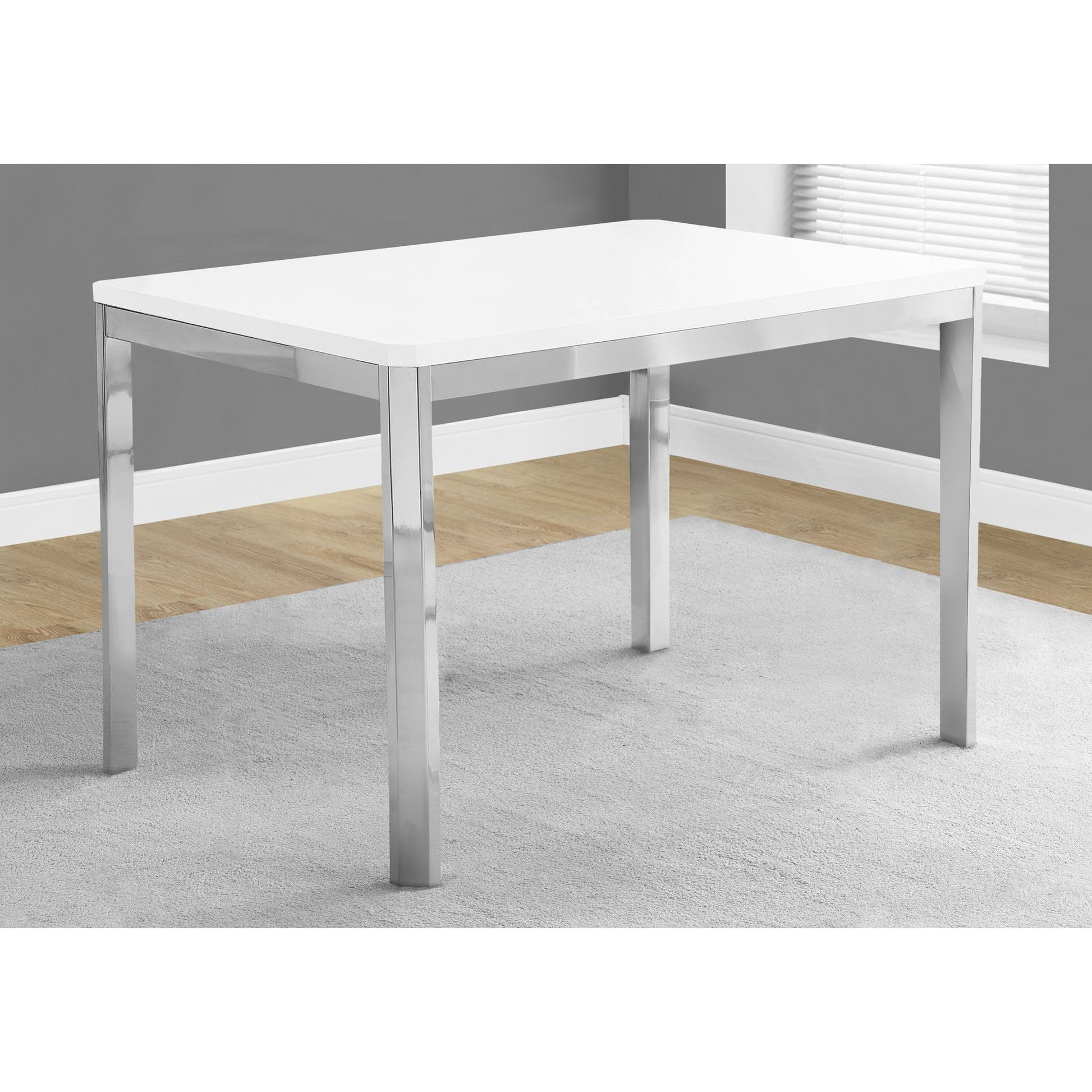 HomeRoots 31.5" X 47.5" X 30" Particle Board Metal Dining Table in White Finish