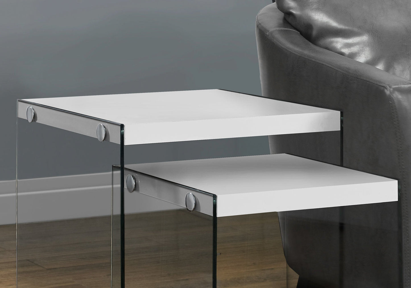 HomeRoots 35.5" Glossy White Particle Board and Clear Glass Nesting Table in Set of 2