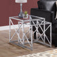 HomeRoots 38" Chrome Metal and Tempered Glass Nesting Table in Set of 2