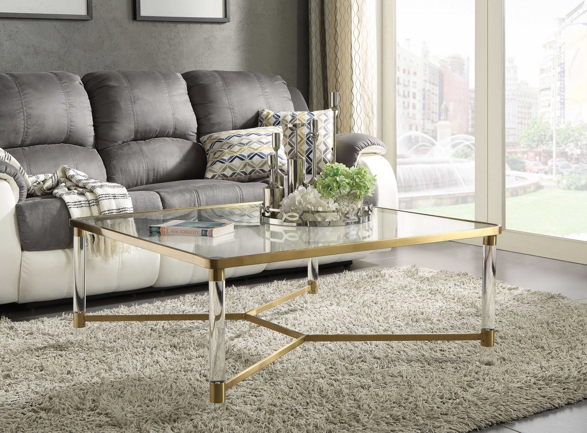 HomeRoots 39" x 39" x 17" Clear Acrylic Gold Stainless Steel And Clear Glass Coffee Table