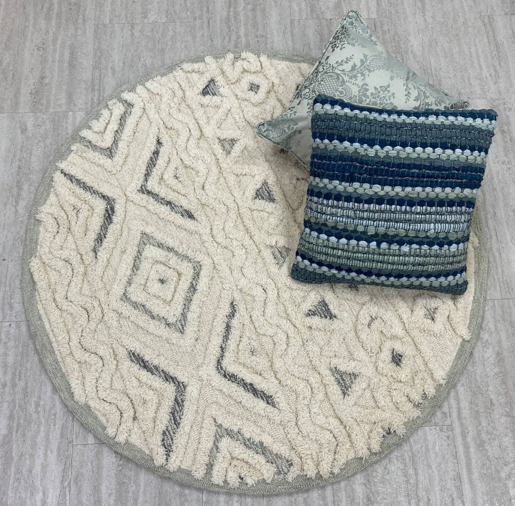 HomeRoots 4' Round Cream Modern Geometric Area Rug