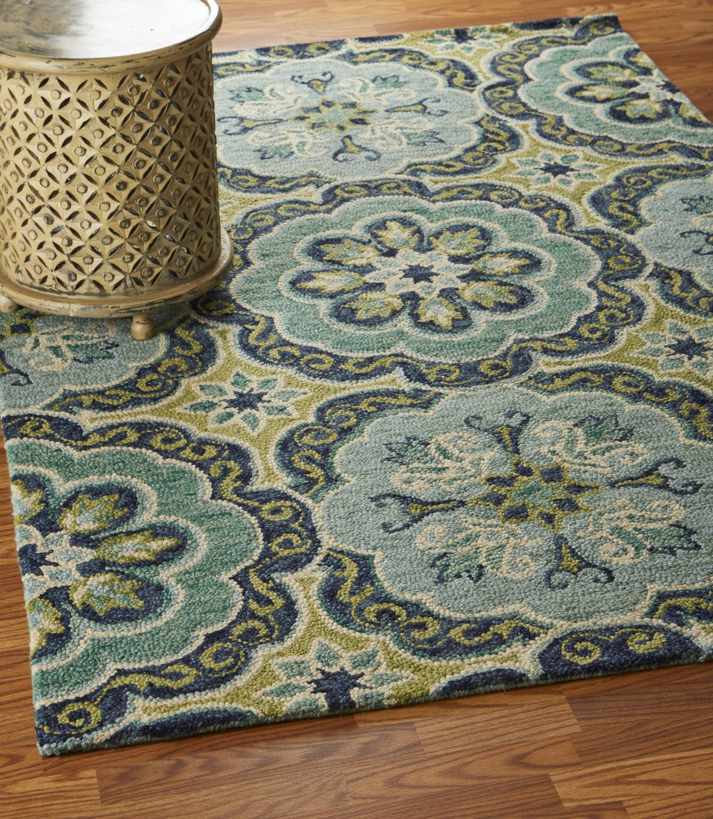 HomeRoots 4’ Round Floral Artwork Area Rug in Green Finish