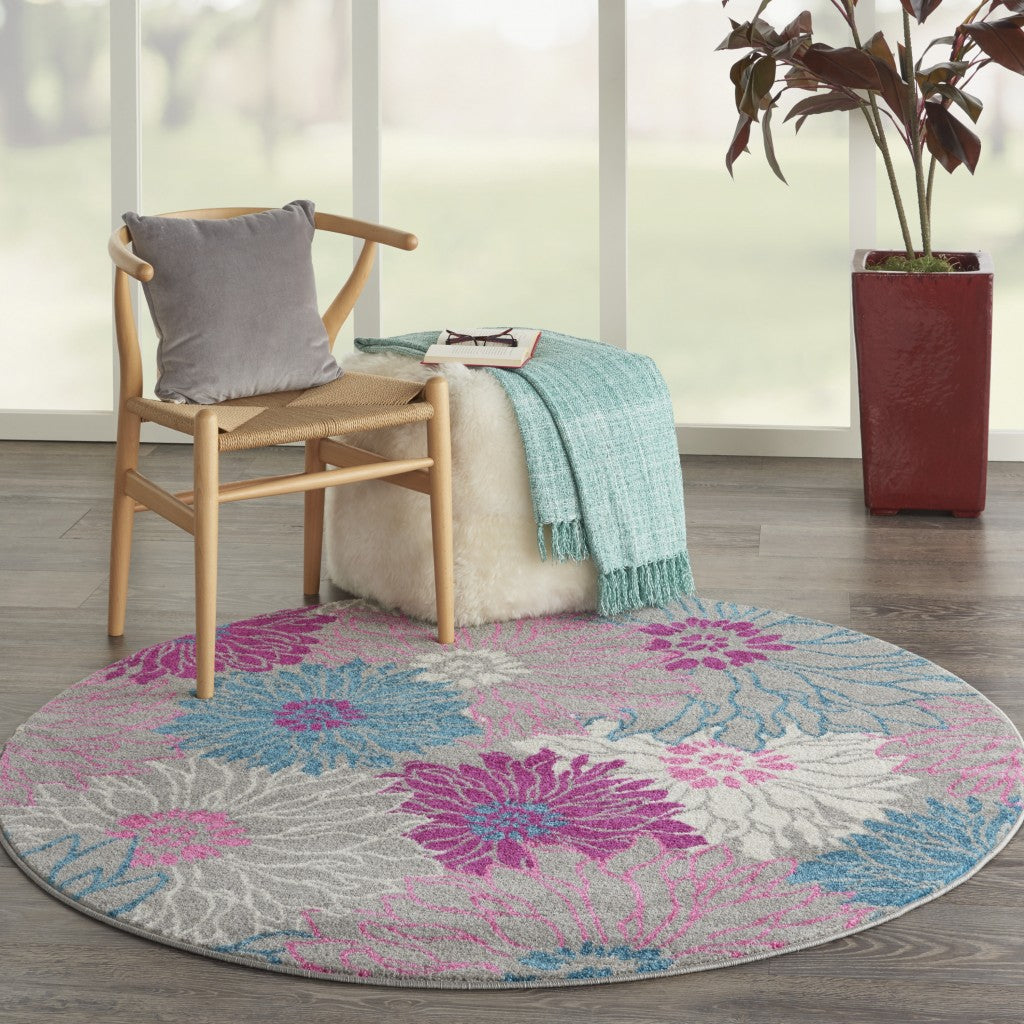 HomeRoots 4’ Round Gray and Pink Tropical Flower Area Rug