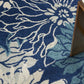HomeRoots 4' Round Navy and Ivory Floral Area Rug