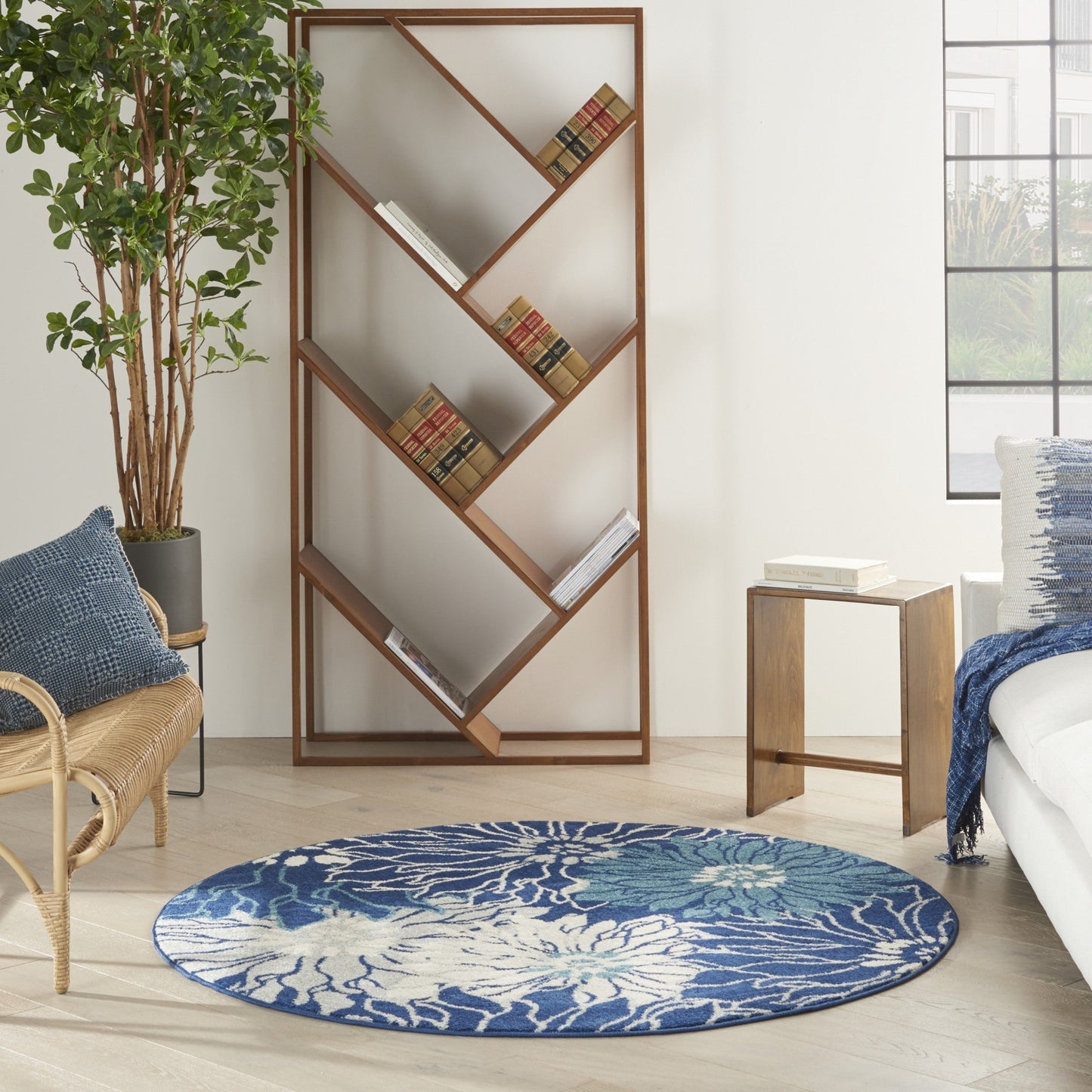 HomeRoots 4' Round Navy and Ivory Floral Area Rug