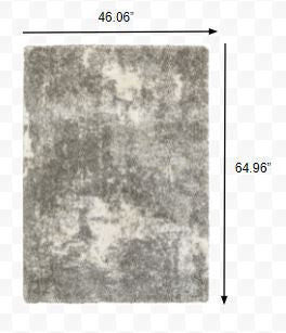 HomeRoots 4' x 6' Gray and Ivory Distressed Abstract Area Rug