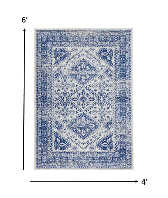 HomeRoots 4' x 6' Ivory and Navy Geometric Area Rug