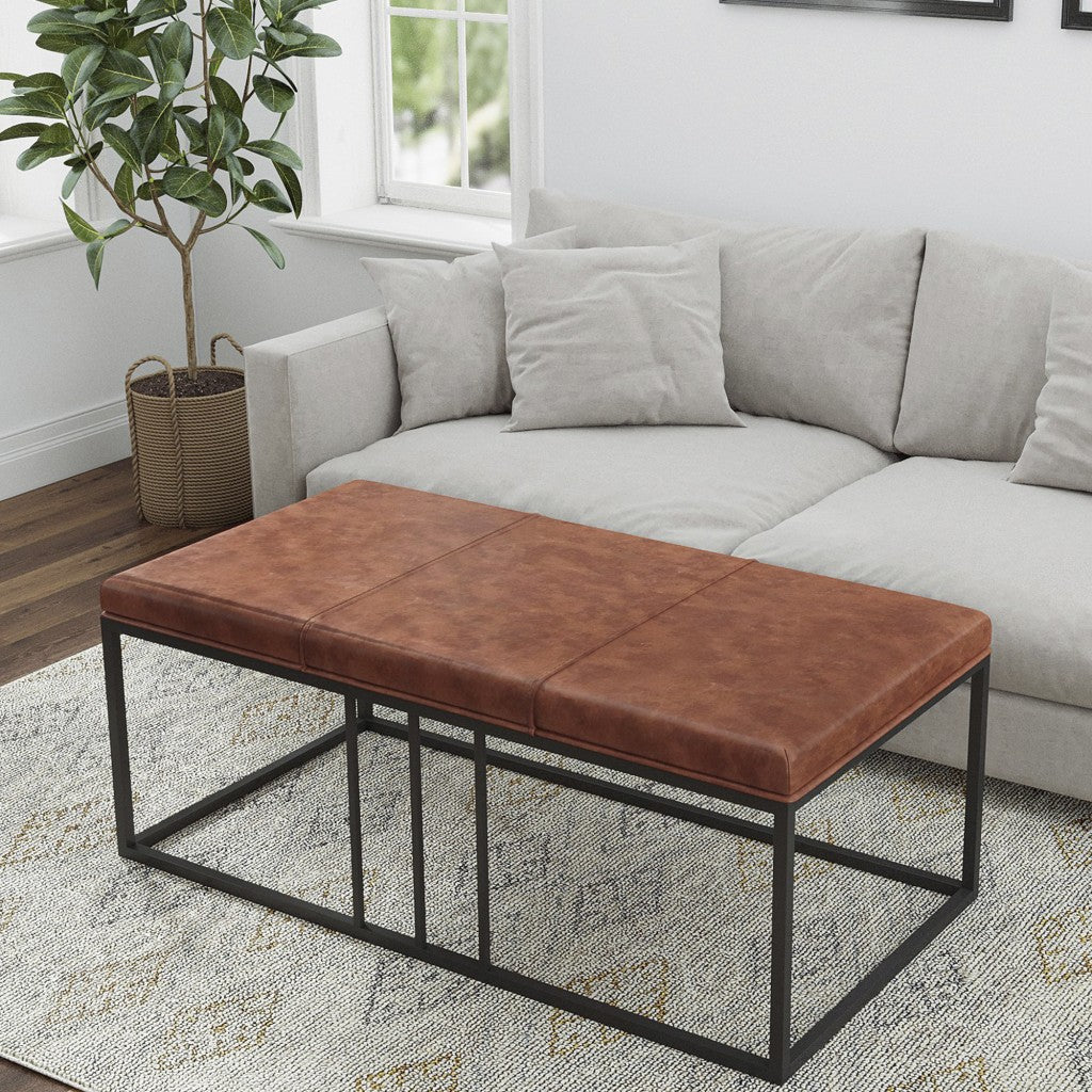 HomeRoots 46" Faux Leather And Metal Coffee Table With Brown and Black Finish