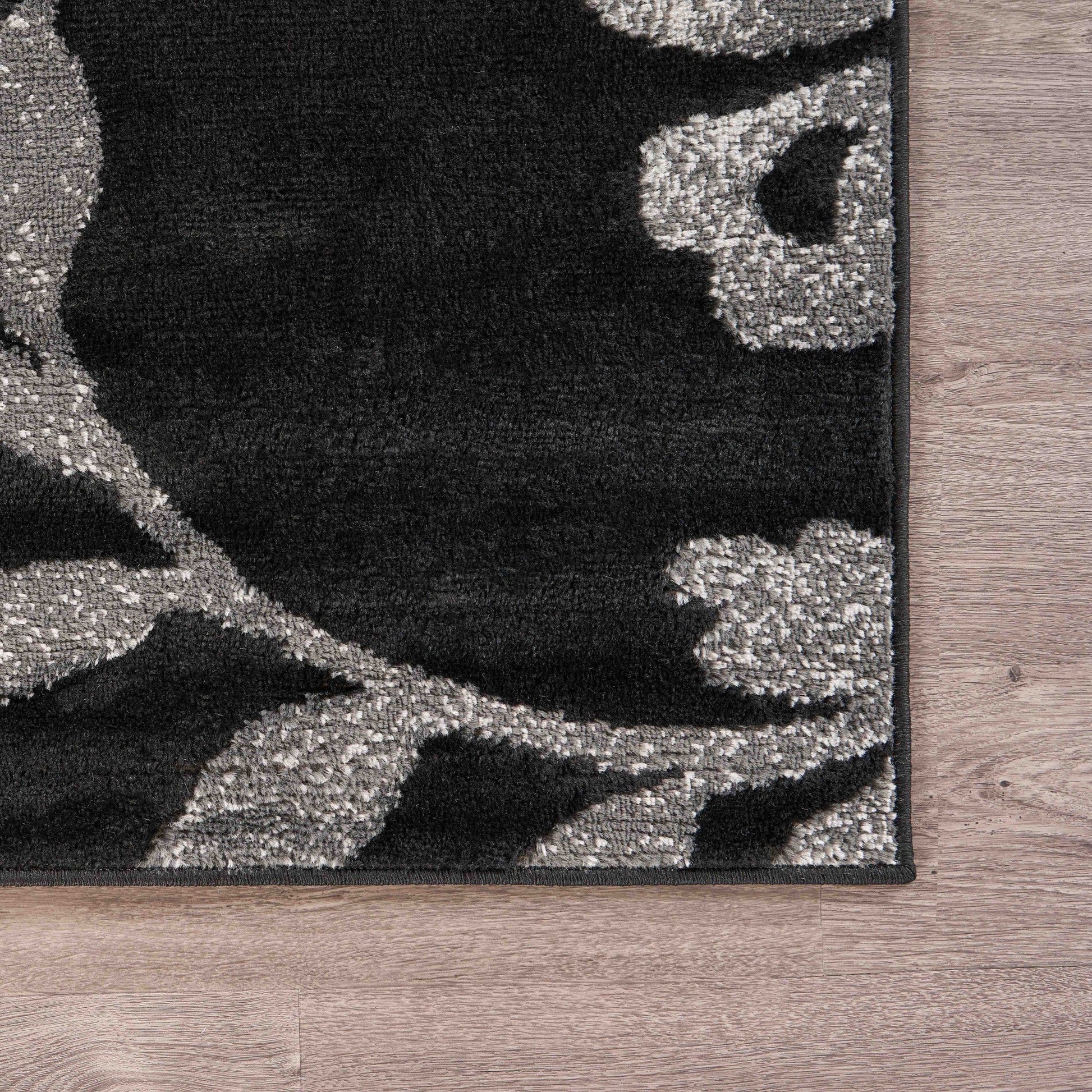 HomeRoots 5’ x 7’ Black Filigree Vines Area Rug