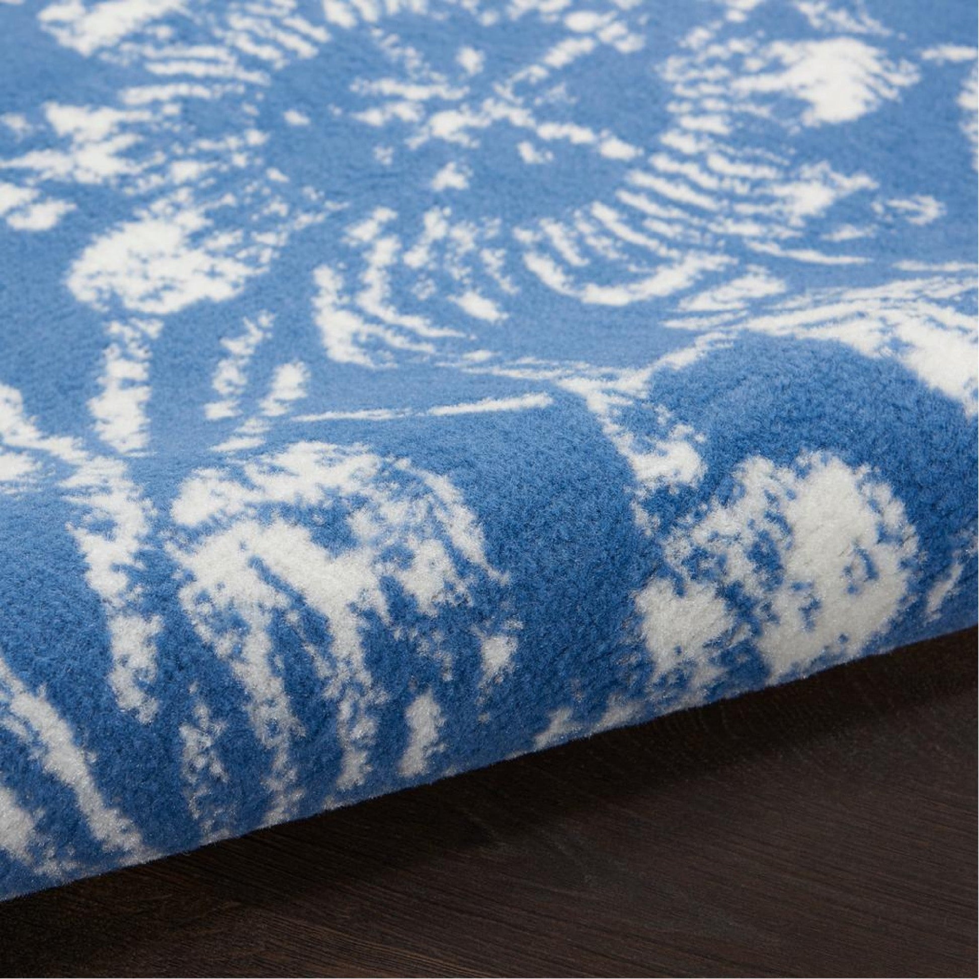 HomeRoots 5’ x 7’ Blue Area Rug With Ivory Floral Vines Finish