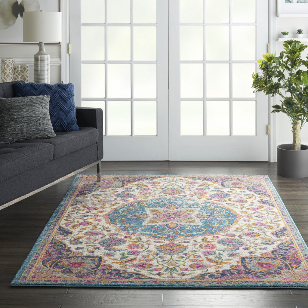 HomeRoots 5’ x 7’ Floral Medallion Area Rug in Pink and Blue Finish