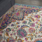 HomeRoots 5’ x 7’ Floral Medallion Area Rug in Pink and Blue Finish