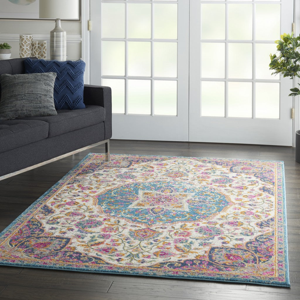 HomeRoots 5’ x 7’ Floral Medallion Area Rug in Pink and Blue Finish