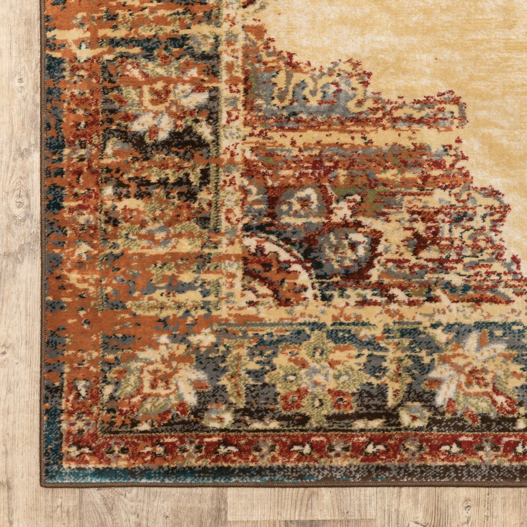 HomeRoots 5’ x 7’ Gold and Orange Floral Medallion Area Rug