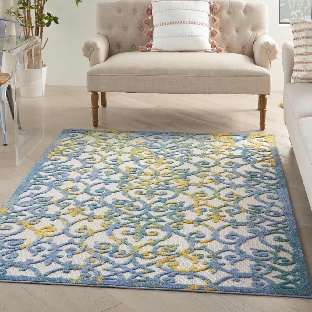 HomeRoots 5’ x 7’ Ivory and Blue Indoor Outdoor Area Rug