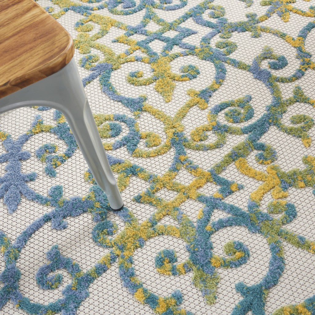 HomeRoots 5’ x 7’ Ivory and Blue Indoor Outdoor Area Rug