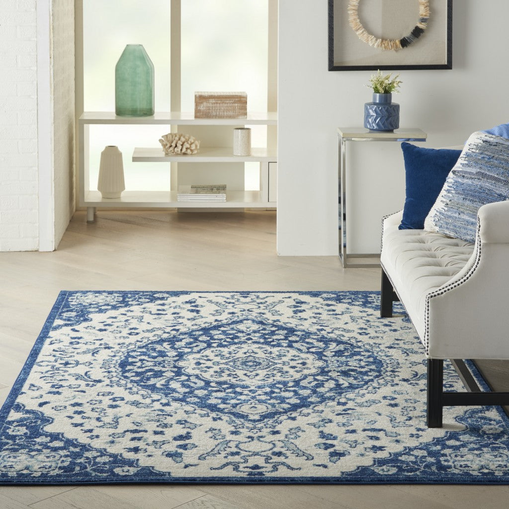 HomeRoots 5’ x 7’ Ivory and Blue Medallion Area Rug