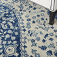 HomeRoots 5’ x 7’ Ivory and Blue Medallion Area Rug