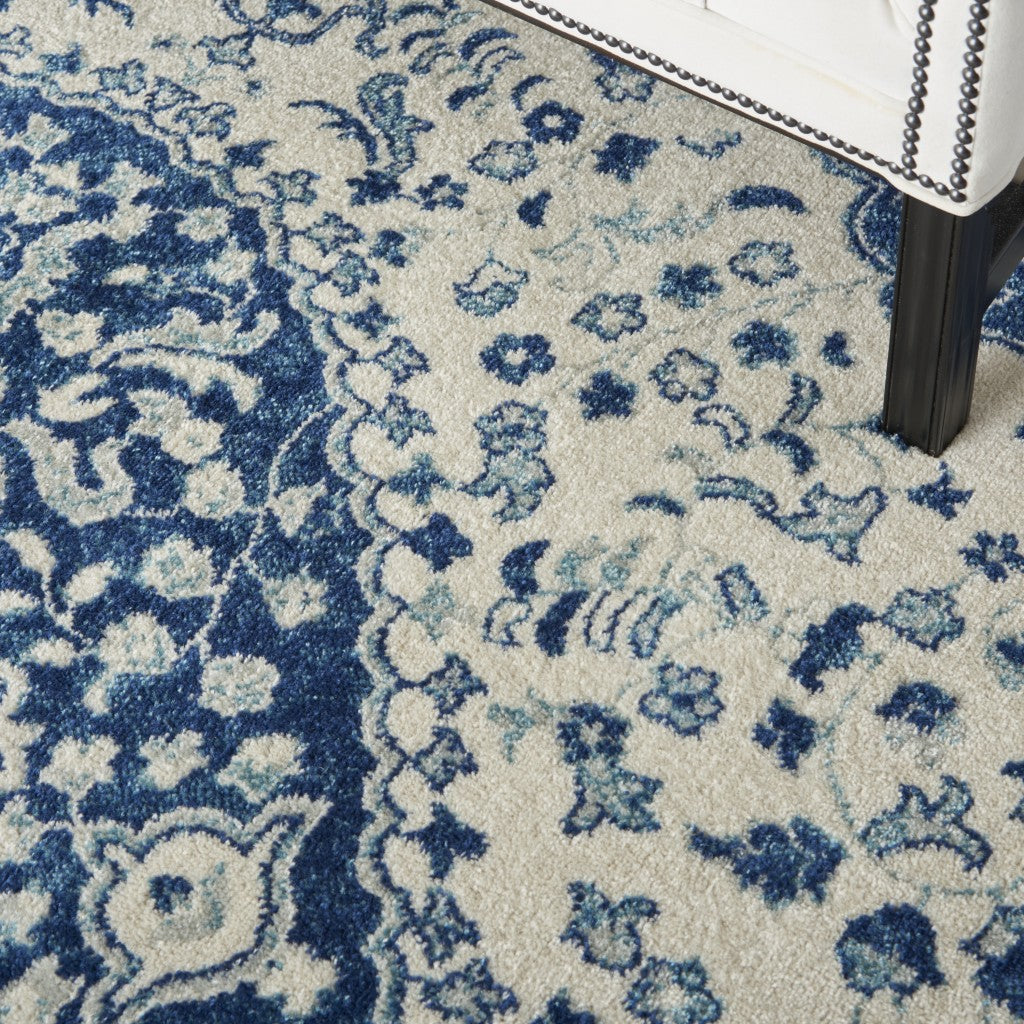 HomeRoots 5’ x 7’ Ivory and Blue Medallion Area Rug