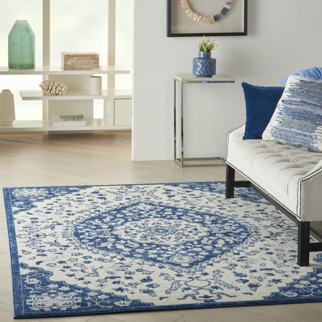 HomeRoots 5’ x 7’ Ivory and Blue Medallion Area Rug
