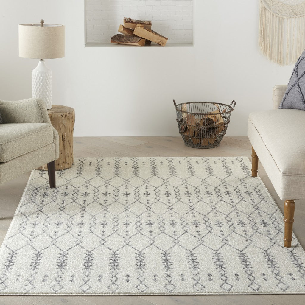 HomeRoots 5’ x 7’ Ivory and Gray Geometric Area Rug