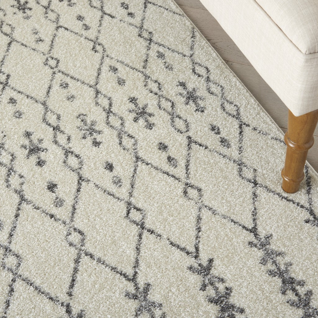 HomeRoots 5’ x 7’ Ivory and Gray Geometric Area Rug