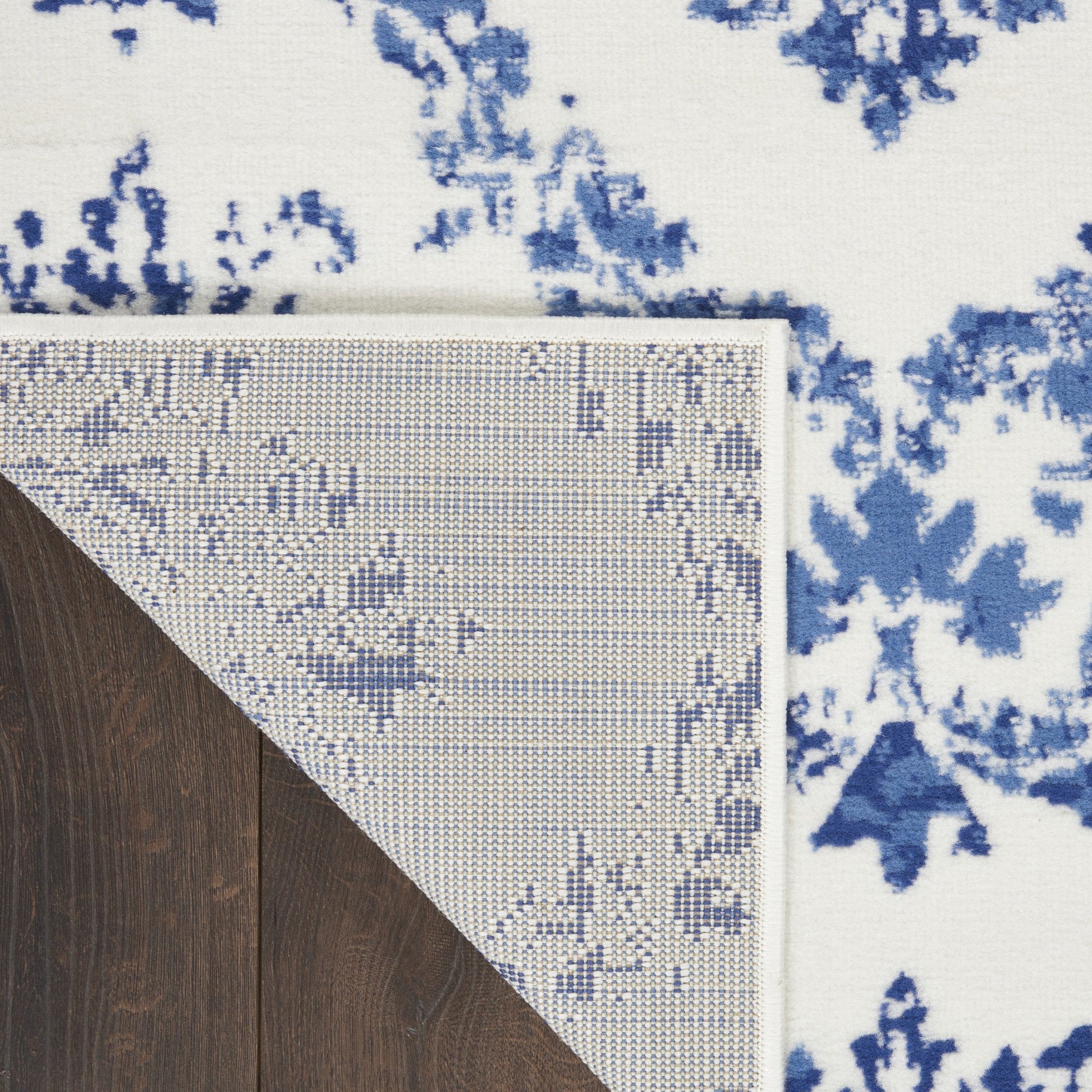 HomeRoots 5’ x 7’ Ivory and Navy Damask Area Rug