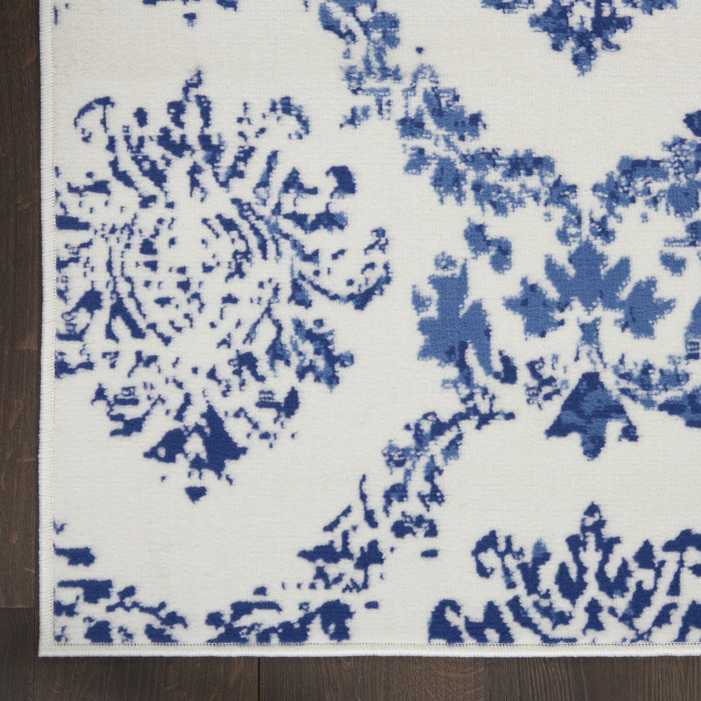 HomeRoots 5’ x 7’ Ivory and Navy Damask Area Rug