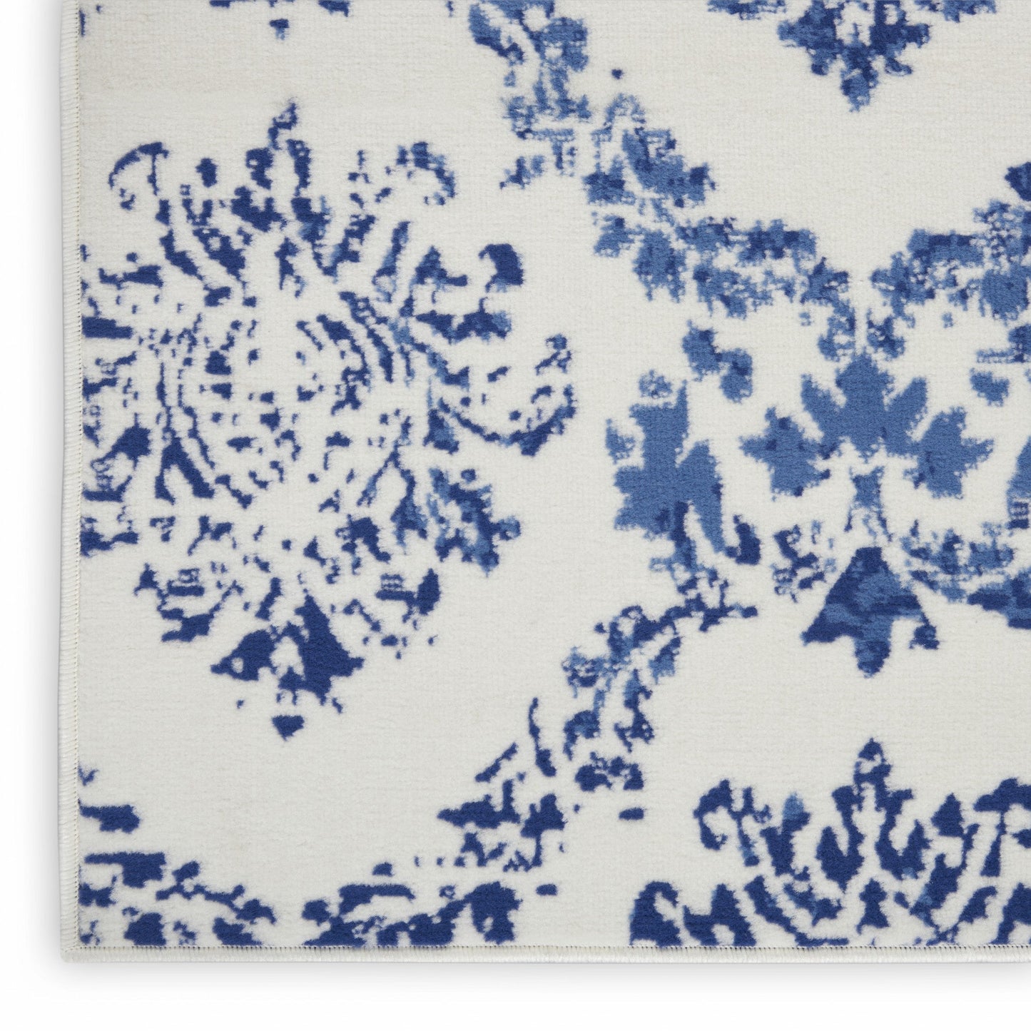 HomeRoots 5’ x 7’ Ivory and Navy Damask Area Rug